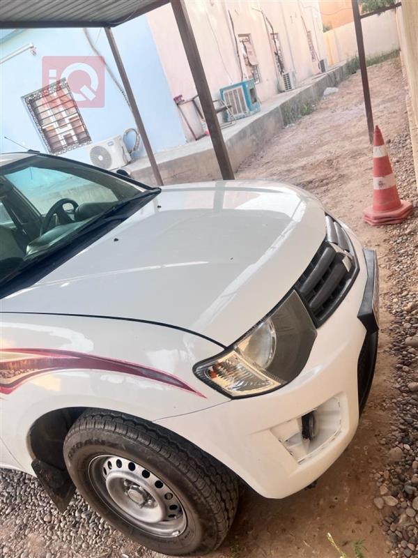ميتسوبيشي L200 2010 للبيع في العراق - العلم